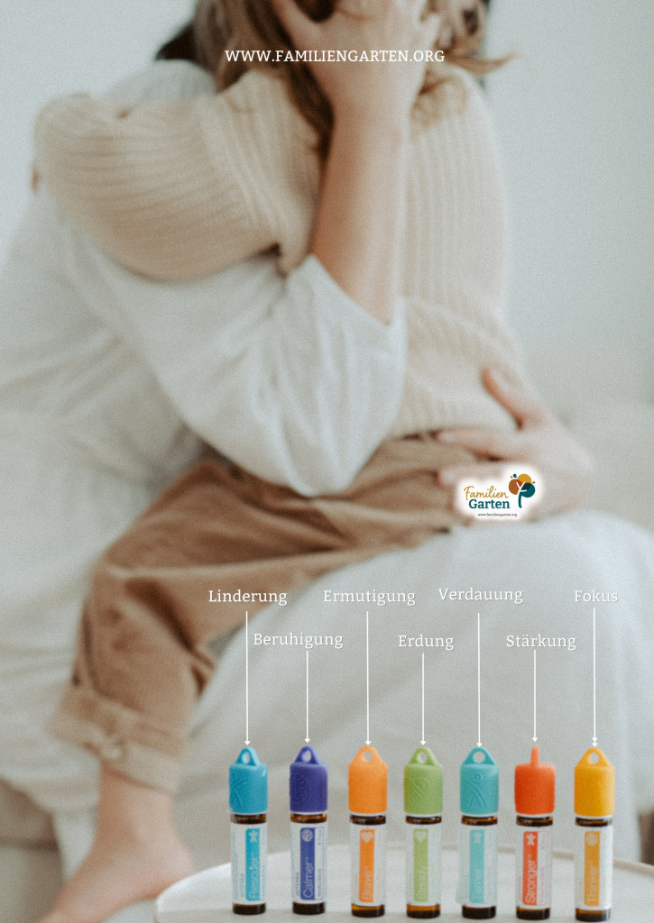 eine Mama hält ihr kleines Kind schützend im Arm da darunter ist die doTERRAKidsCollection zu sehen - ätherischeÖle für Kinder 